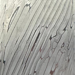 Forged Koa Damascus steel billet with flowing woodgrain-inspired lines