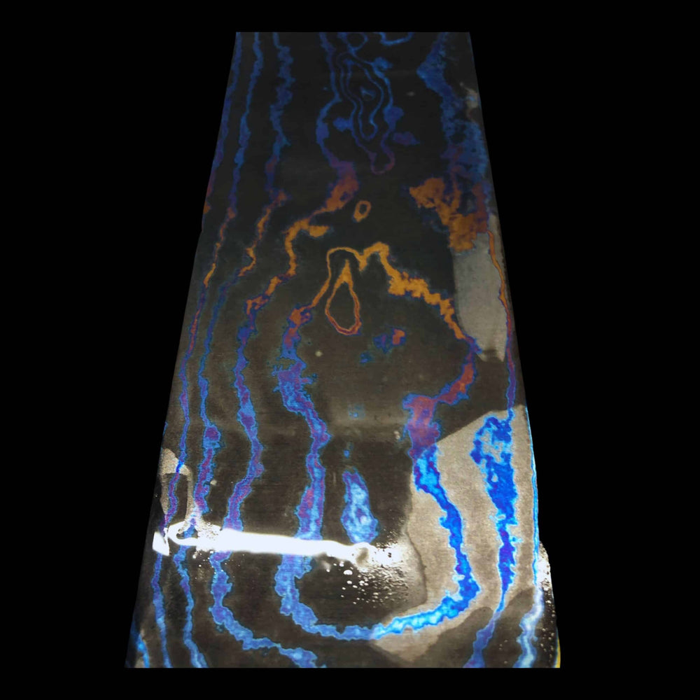 Zirmascus billet – forged blend of zirconium and titanium with striking color contrast