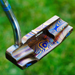 Legend Golf Putter made with Vegas Forge 304_316 stainless damascus, flamed color with blues, purples and browns.