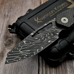 a blade made of forged koa patterned damascus steel on wood background