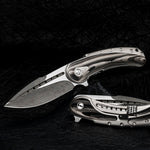 sharp w lines of herringbone pattern stainless damascus on black background