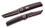 two folding Oeser knives featuring spirograph copper infused san mai by vegas forge