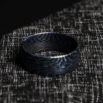 Mens ring made of zirmascus which is what vegas forge calls their titanium and zirconium damascus product used for jewelery