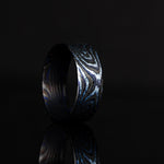 Mens ring made of zirmascus which is what vegas forge calls their titanium and zirconium damascus product