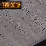 close up of basketweave pattern stainless damascus billet