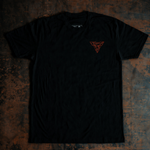 black shirt with vegas forge logo on rusted metal background