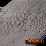 diamondback pattern stainless damascus close up picture with a grey background