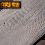 diamondback pattern stainless damascus close up picture with a grey background