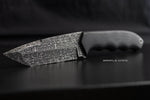 Custom knife crafted with stainless Dot Matrix Damascus blade, showing sharp contrast and futuristic pattern detail.