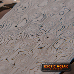 Fireball Damascus billet showing concentric ring pattern after etch