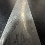 Forged Koa Damascus billets in stainless and carbon steel for knives