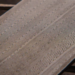 close up picture of a herringbone patterned stainless damascus steel billet made by vegas forge