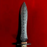 double edged knife made from stainless honeycomb damascus with red background