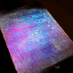 close up picture of ladder pattern damtanium by vegas forge