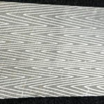 close up picture of a lightning patterned damascus steel billet