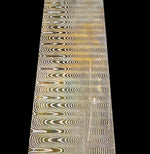 bronze and nickel-silver mokume gane billet in ladder pattern with black background