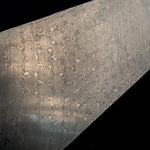 Raindrop Pattern Damascus billet close-up with circular rings