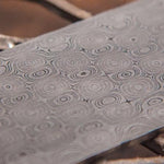 Raindrop Pattern Damascus billet close-up with circular rings