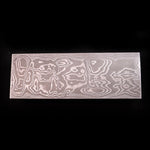 a random pattern stainless san mai billet on black background