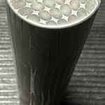 top view of a stainless razorwire pattern stainless damascus round bar