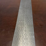 a billet of stainless san mai damascus in signature vegas forge pattern