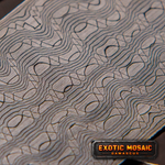 reptilian patterned stainless steel damascus billet close up