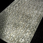 Close-up of Reptilian Damascus etch showing bold contrast and fine grind lines