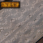 reptilian patterned stainless steel damascus billet close up
