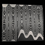 close up image of a stainless san mai in vegas forge spirograph pattern on black background