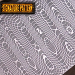 Patterned spirograph damascus steel with 'Signature Pattern' label on a gray background