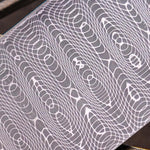 close up picture of spirograph patterned damascus steel by vegas forge available in stainless and carbon