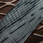 close up on twisted thorn pattern stainless damascus steel billet