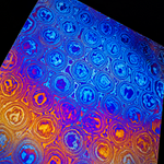 circular titanium damascus pattern which looks like bubble wrap on black background