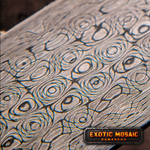 close up picture of a damascus steel billet forged by vegas forge in fireball pattern