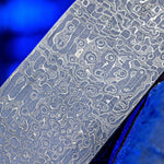 close up image of a virus pattern stainless damascus billet with blue background colors